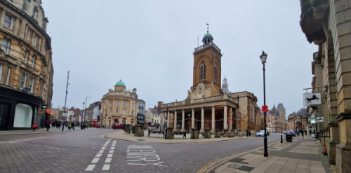 This image: A photo of All Saints Church from Bridge Street.
The map in this chapter shows these focus areas represented by different coloured boundaries. Within each focus area is an interactive map marker which shows a photograph of how that area looks today.